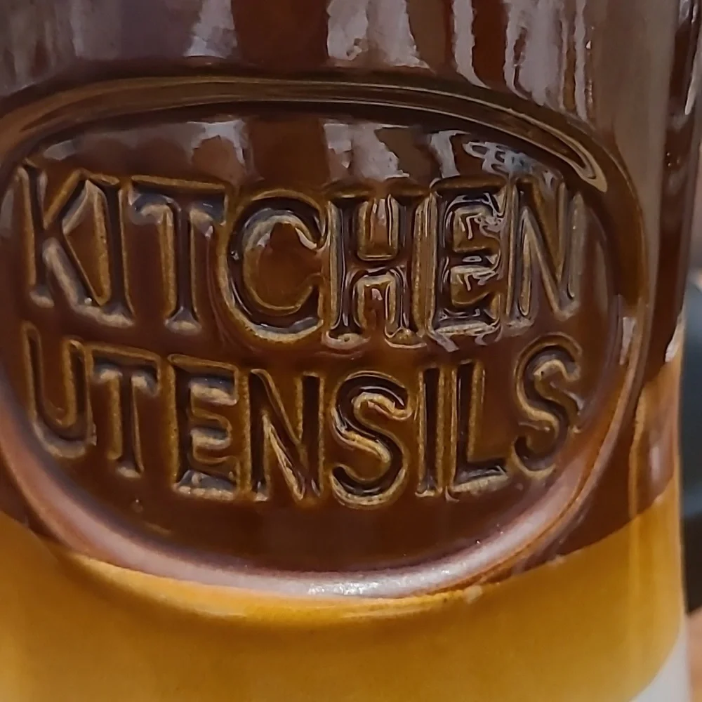 Vintage kitchen utensils holder.